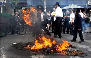 Haredim riot and burn trash cans in Jerusalem’s Mea She’arim neighborhood in protest over the planned Gay Pride Parade. - 14.5 kb